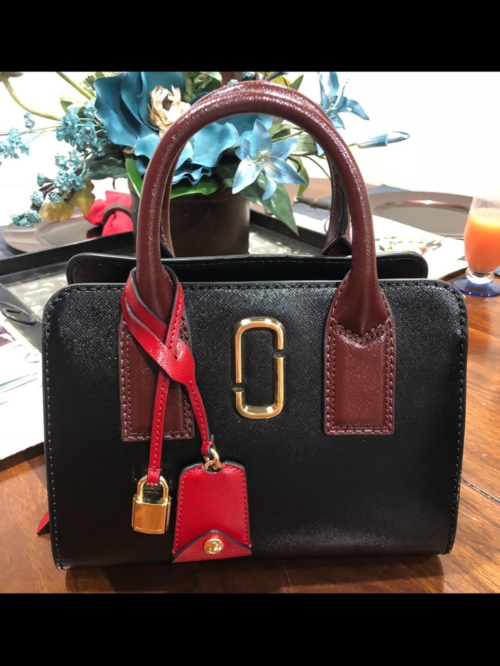 Marc Jacobs Black Satchel with Brown Handles and Red Tag
